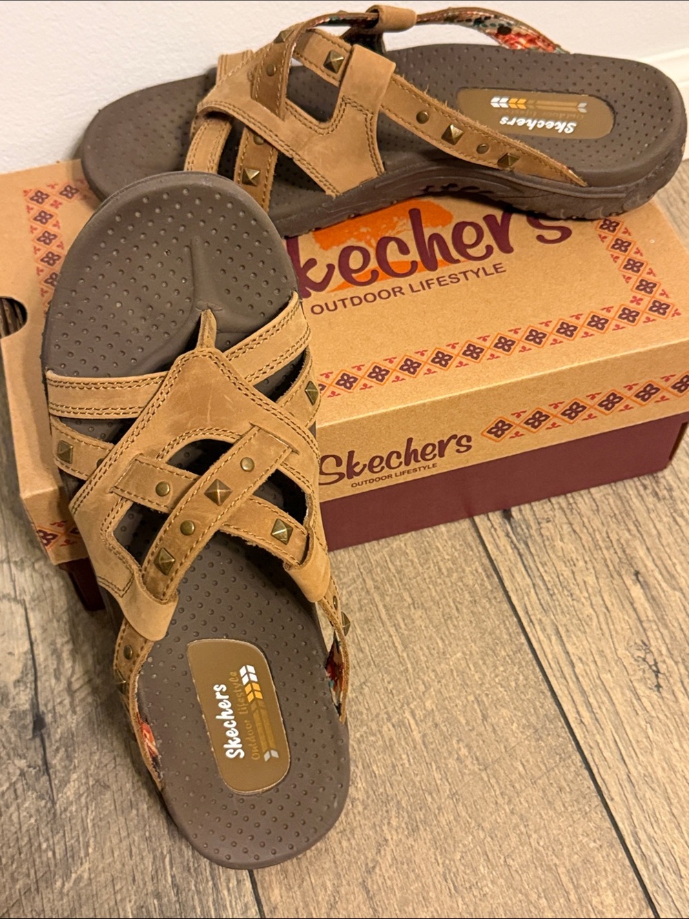 Skechers Leather Reggae Rockin’ Soundstage Dessert Cross-Strap Slide Sandals